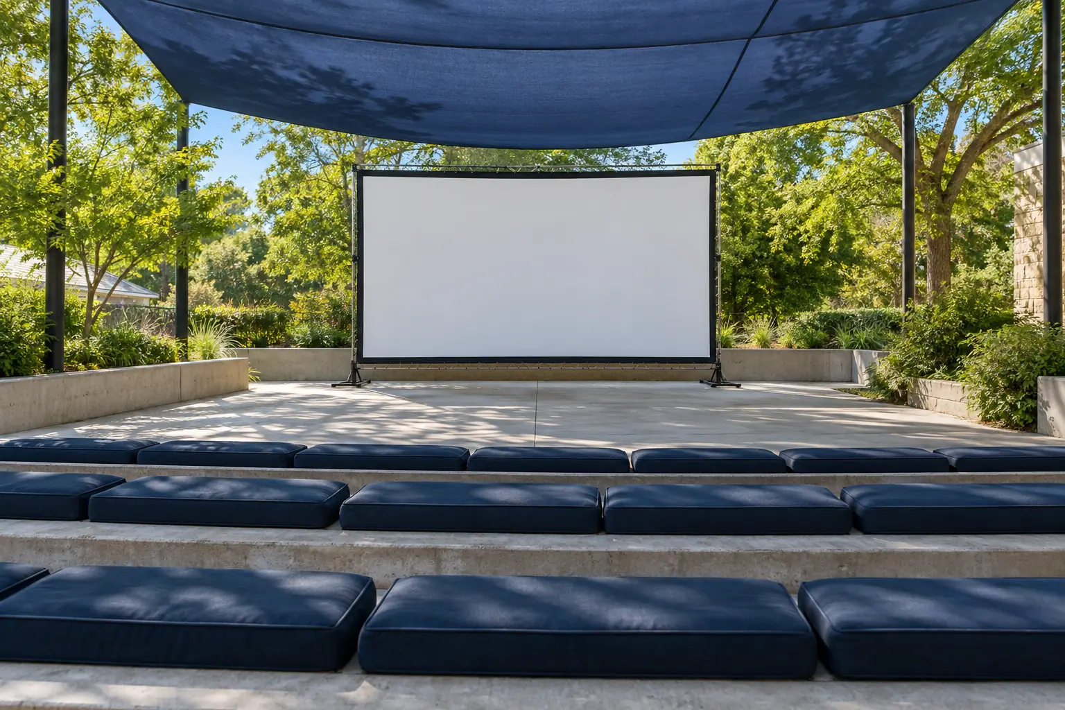 Illustration: Navy outdoor cushions arranged on low concrete steps facing a plain portable screen beneath a blue canopy.