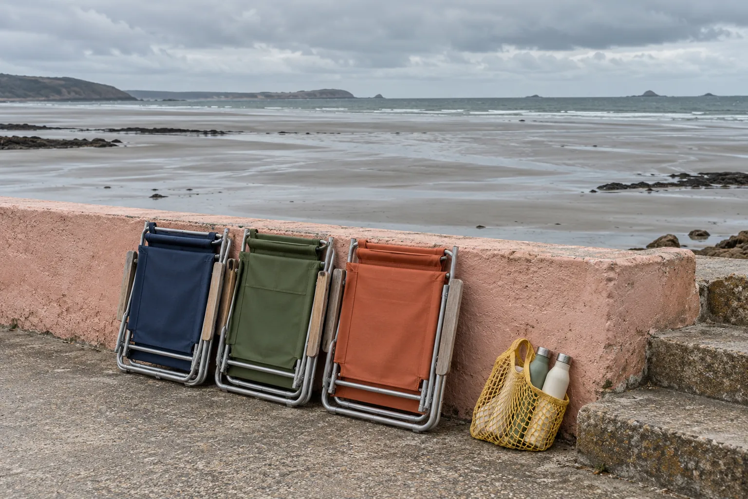 Illustration: Folded beach chairs and a bottle bag beside empty tidal steps.