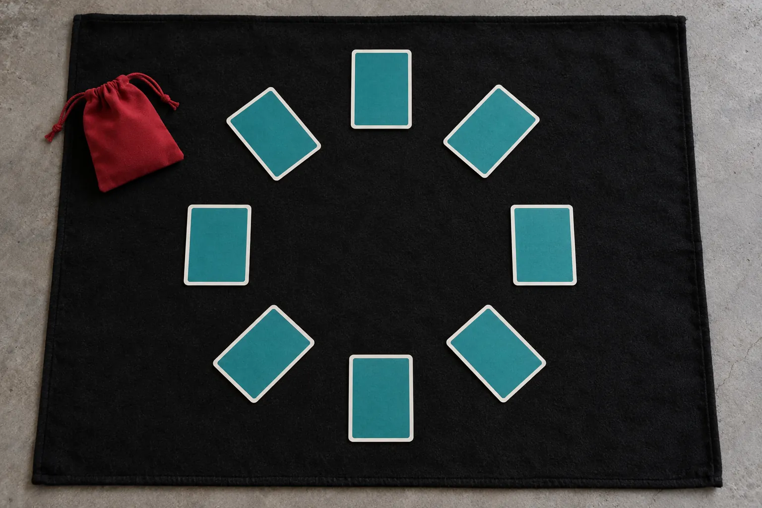 Illustration: Teal-backed cards arranged face-down in a circle on black felt.